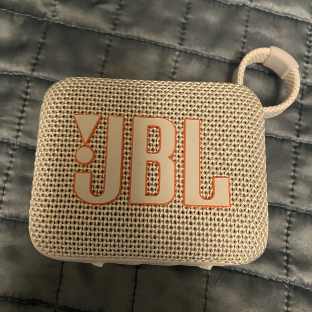 JBL White Bluetooth Speaker with Orange Logo